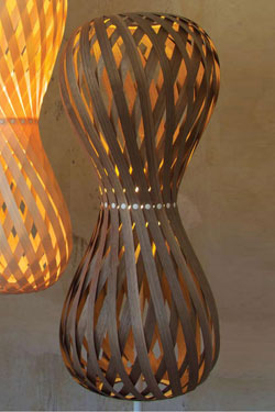 Swing floor lamp shaped hourglass rounded slats of walnut wood. Dreizehngrad 13°. 
