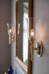 Applique murale chromée salle de bain flambeau lisse et verre transparent Dryden 2. Elstead Lighting. 