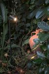 Black outdoor beacon with cylindrical spot on large pointed stem Seth . Faro. 