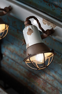 Single spotlight made of ceramic and rusty metal. Ferroluce. 