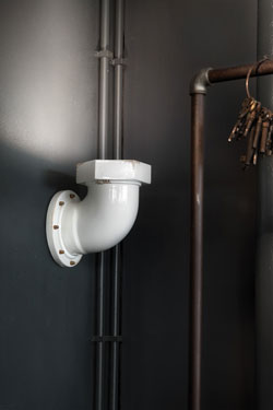 White ceramic wall light industrial style. Ferroluce. 