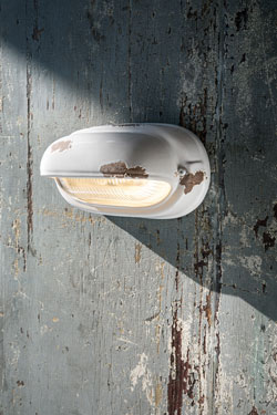 White chipped ceramic wall light vintage style. Ferroluce. 