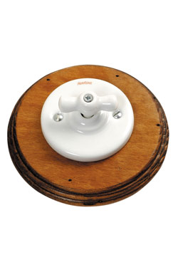 Garby Colonial interrupteur rotatif en porcelaine blanche et bois vieilli va et vient . Fontini. 