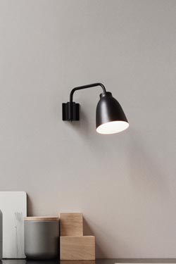 Black Caravaggio wall lamp. Fritz Hansen. 