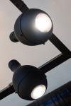 Contemporary articulated ceiling light in matt black Capula. Gau Lighting. 