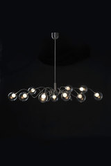 Riddle Six oval 10-light chandelier in clear glass. Harco Loor. 