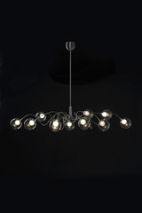Suspension ovale 10 lumières en verre transparent Riddle six. Harco Loor. Suspension ovale 10 lumières en verre transparent Riddle six. Harco Loor.