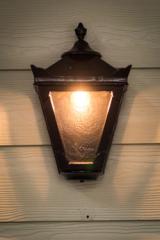 Small outdoor wall light in black cast iron Traditional. HARTE. Small outdoor wall light in black cast iron Traditional. HARTE.