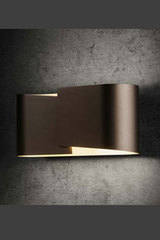 Wall lamp in matt smoked metal with golden interior. Holtkötter. 