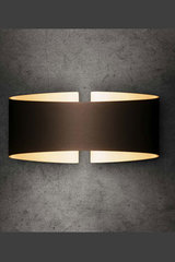 Wall lamp in smoked metal with golden interior folded leaf. Holtkötter. Wall lamp in smoked metal with golden interior folded leaf. Holtkötter.