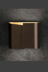 Matte smoked metal wall lamp, large curved leaf Filia. Holtkötter. Matte smoked metal wall lamp, large curved leaf Filia. Holtkötter.