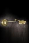 Plano WB wall mounted reading light, in gold. Holtkötter. 