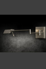Satin nickel articulated bedside wall lamp. Holtkötter. Satin nickel articulated bedside wall lamp. Holtkötter.
