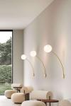 Filo contemporary wall lamp with black stem and white ball. Italamp. 