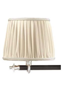 Joseph bronze antique wall lamp and ivory pleated silk lampshade. Jacques Garcia. 