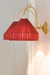 Boileau large double wall lamp in gilded bronze and hanging red theater shade. Jacques Garcia. 