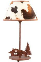Peau de vache Lampe motif chalet. JP Ryckaert. Peau de vache Lampe motif chalet. JP Ryckaert.