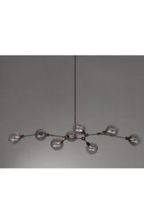 Ora chandelier constellation 8 lights patinated black. KAIA. Ora chandelier constellation 8 lights patinated black. KAIA.