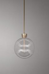 Clear glass bubble and golden metal pendantETU. KAIA. Clear glass bubble and golden metal pendantETU. KAIA.