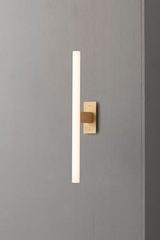 Nea 50cm tube wall lamp with golden support. KAIA. Nea 50cm tube wall lamp with golden support. KAIA.