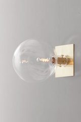 Small wall lamp in glass bubble and gold metal. KAIA. Small wall lamp in glass bubble and gold metal. KAIA.