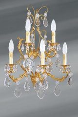 Applique de style Louis XV bronze doré et cristal cinq lumières. Lucien Gau. Applique de style Louis XV bronze doré et cristal cinq lumières. Lucien Gau.
