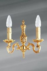 Applique en bronze Louis XV deux lumières. Lucien Gau. Applique en bronze Louis XV deux lumières. Lucien Gau.