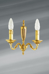 Applique en bronze Louis XVI patiné vieil or, deux bougies. Lucien Gau. 