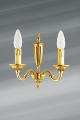 Applique en bronze Louis XVI patiné vieil or, deux bougies. Lucien Gau. Applique en bronze Louis XVI patiné vieil or, deux bougies. Lucien Gau.