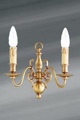 Applique laiton style hollandais deux lumières . Lucien Gau. Applique laiton style hollandais deux lumières . Lucien Gau.