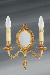 Applique miroir Louis XV en bronze vieil or double bougeoir. Lucien Gau. 