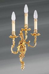 Applique murale en bronze Louis XV vieil or trois bougeoirs. Lucien Gau. Applique murale en bronze Louis XV vieil or trois bougeoirs. Lucien Gau.