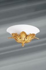 Wall lamp with gilded bronze leaves and white opal glass. Lucien Gau. 