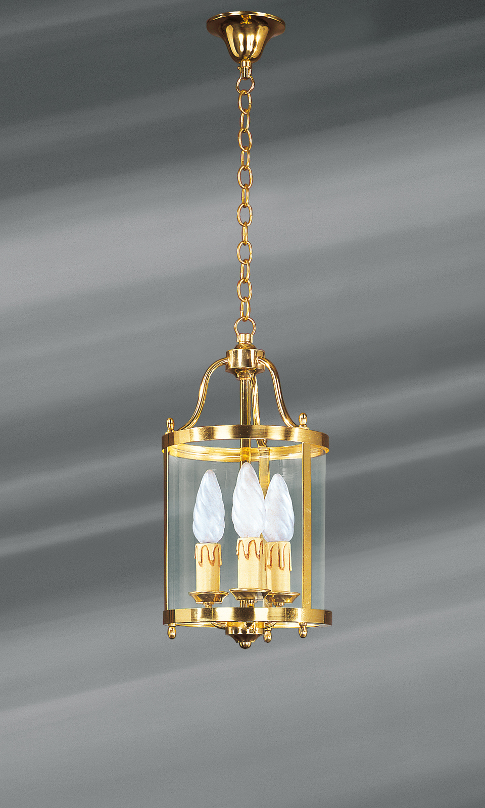 Classic style lantern in polished gilt bronze and glass. Lucien Gau. 