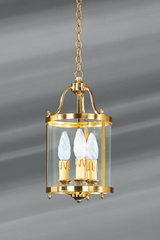 Classic style lantern in polished gilt bronze and glass. Lucien Gau. 