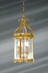 Glass and bronze lantern worked in classical style with four lights. Lucien Gau. 