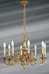 Louis XIII solid bronze eight lights chandelier. Lucien Gau. 
