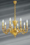 Louis XVI chandelier in gilded bronze, eight lights. Lucien Gau. 