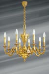 Louis XVI chandelier in gilded bronze, eight lights. Lucien Gau. 