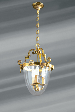 Three-light bronze and glass ovoid pendant. Lucien Gau. 
