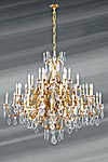 Very large gilded chandelier Louis XV in solid bronze and bohemian crystal. Lucien Gau. 