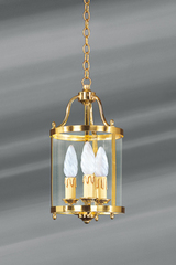 Lanterne de style classique en bronze doré poli et verre . Lucien Gau. Lanterne de style classique en bronze doré poli et verre . Lucien Gau.