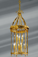 Lanterne de style Louis XVI en bronze massif et verre bombé, neuf lumières sur deux étages. Lucien Gau. Lanterne de style Louis XVI en bronze massif et verre bombé, neuf lumières sur deux étages. Lucien Gau.