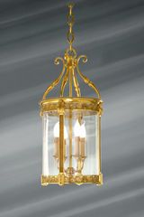 Lanterne en verre et bronze massif travaillé de style classique à quatre lumières . Lucien Gau. 