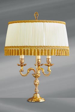 Louis XV golden candlestick lamp with three lights. Lucien Gau. 