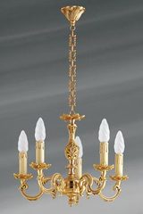 Lustre bronze Louis XV cinq lumières. Lucien Gau. Lustre bronze Louis XV cinq lumières. Lucien Gau.
