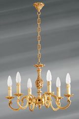 Lustre bronze Louis XV six lumières. Lucien Gau. Lustre bronze Louis XV six lumières. Lucien Gau.