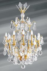 Lustre doré cristal de bohème Louis XVI forme cage quinze lumières. Lucien Gau. Lustre doré cristal de bohème Louis XVI forme cage quinze lumières. Lucien Gau.