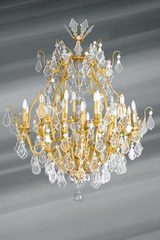 Lustre doré en cristal de bohème Louis XVI forme cage trente lumières. Lucien Gau. Lustre doré en cristal de bohème Louis XVI forme cage trente lumières. Lucien Gau.