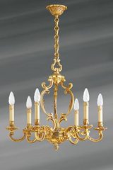 Lustre en bronze doré Louis XV six lumières. Lucien Gau. Lustre en bronze doré Louis XV six lumières. Lucien Gau.